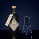 The Illusionist Dry Gin 500ml Next to Illusionist Glass - Front View